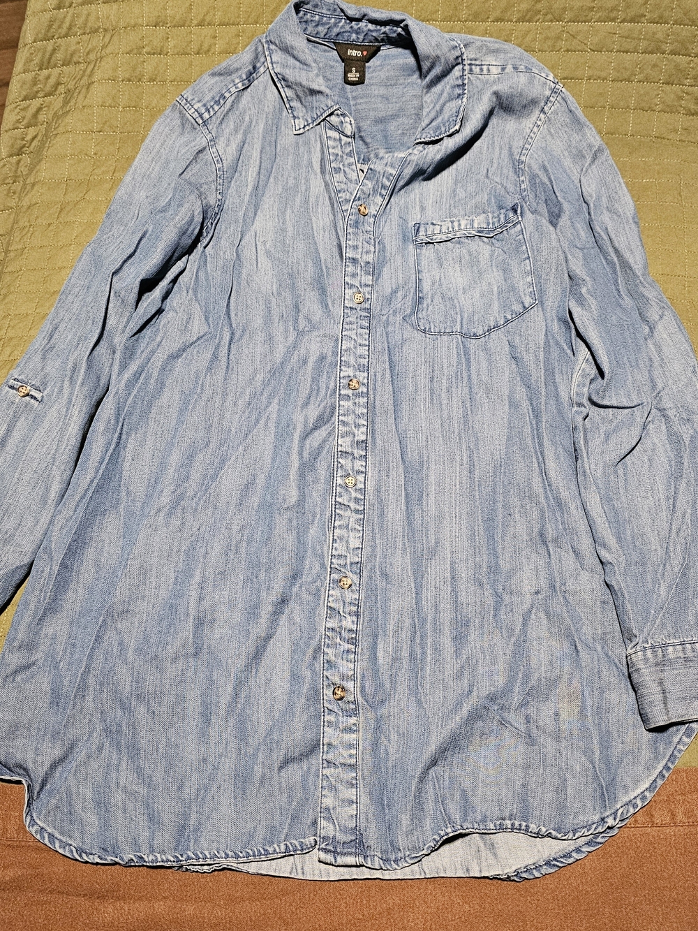 light wash denim button-up shirt
